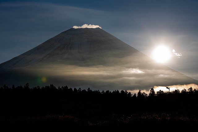 Shinkansen bullet train passing Mount Fuji Japan railway