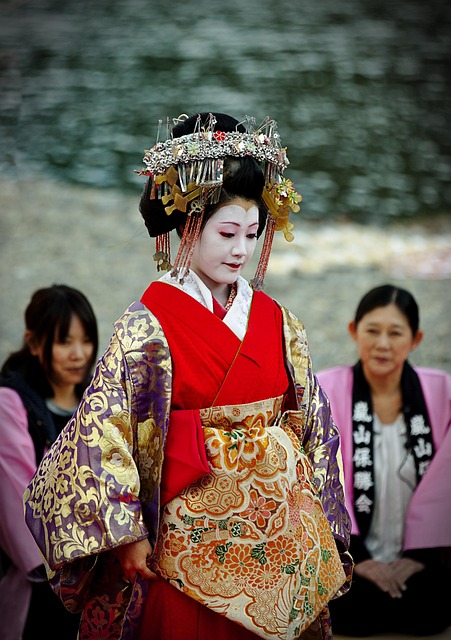 Kansai region Kyoto geisha walking through traditional street